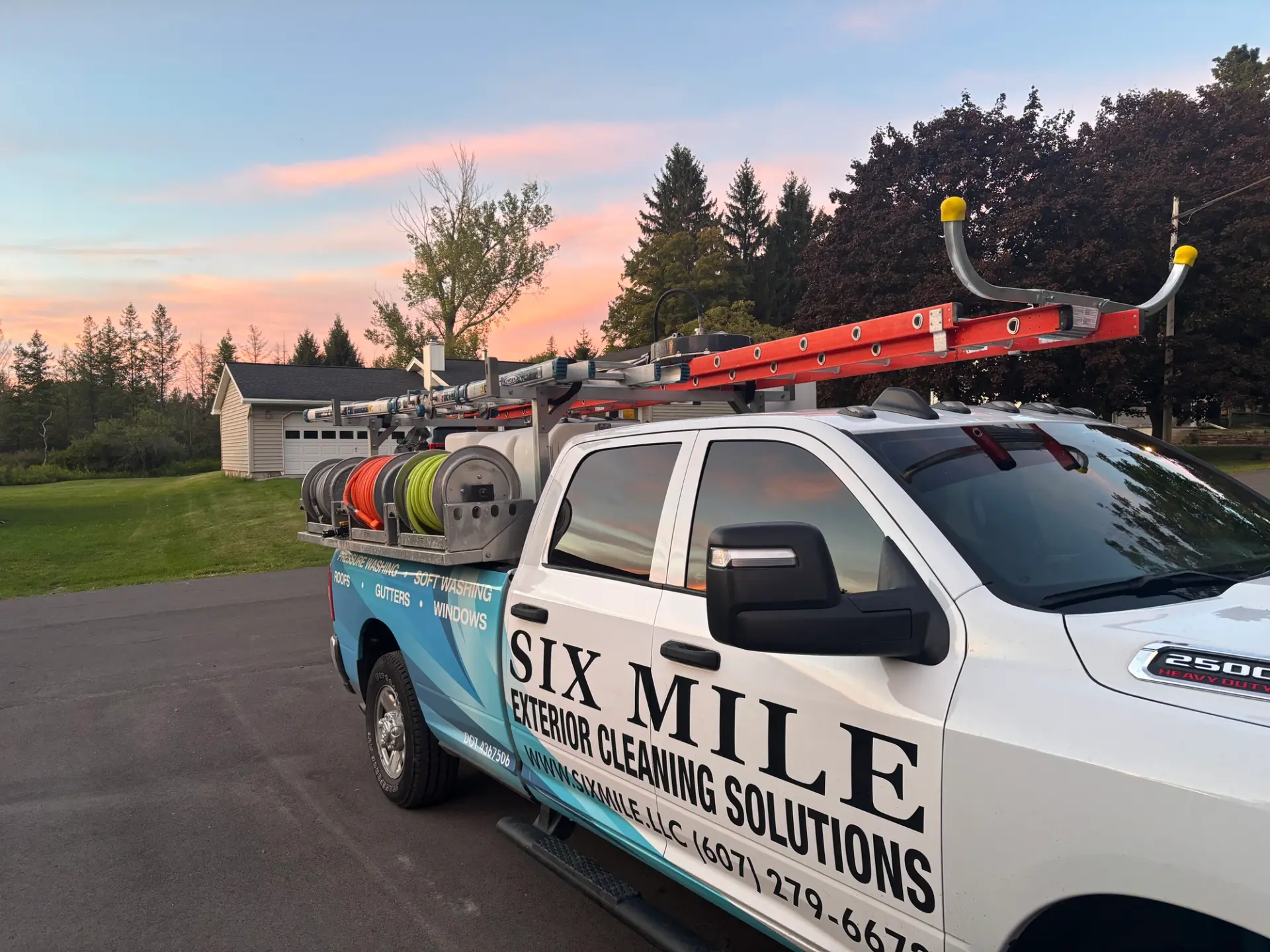 Six Mile Exterior Cleaning service truck at sunset